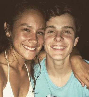Aydon Holley with his rumored girlfriend, Riley smiling at the camera.